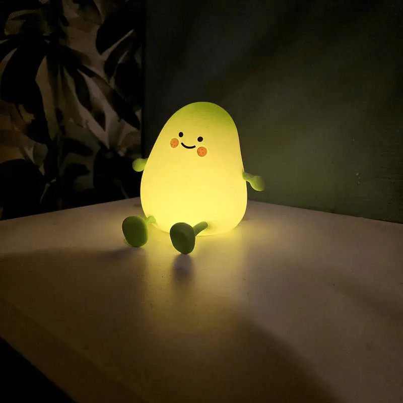 Lámpara mango infantil en fondo oscuro